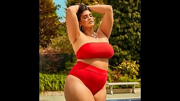 Voluptuous Curves In Sultry Bikini Seduction