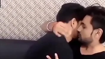 Passionate Indian Men Sharing Intimate Kisses