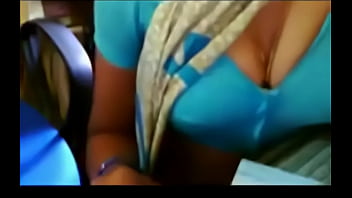Desi Aunty Next Door Shows Off Her Deep Cleavage