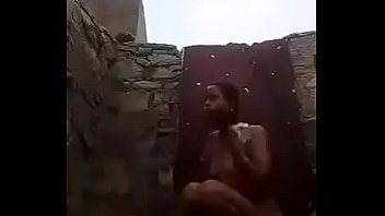 Desi Bhabhi’s Steamy Naked Bath