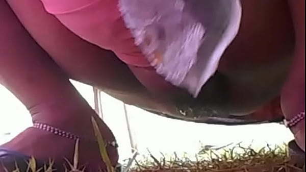Desi Girl Unleashing Her Golden Stream