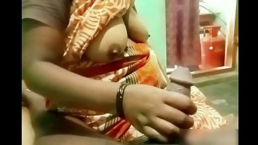 Indian Aunty Stroking That Boy’s Hard Dick Like A Pro